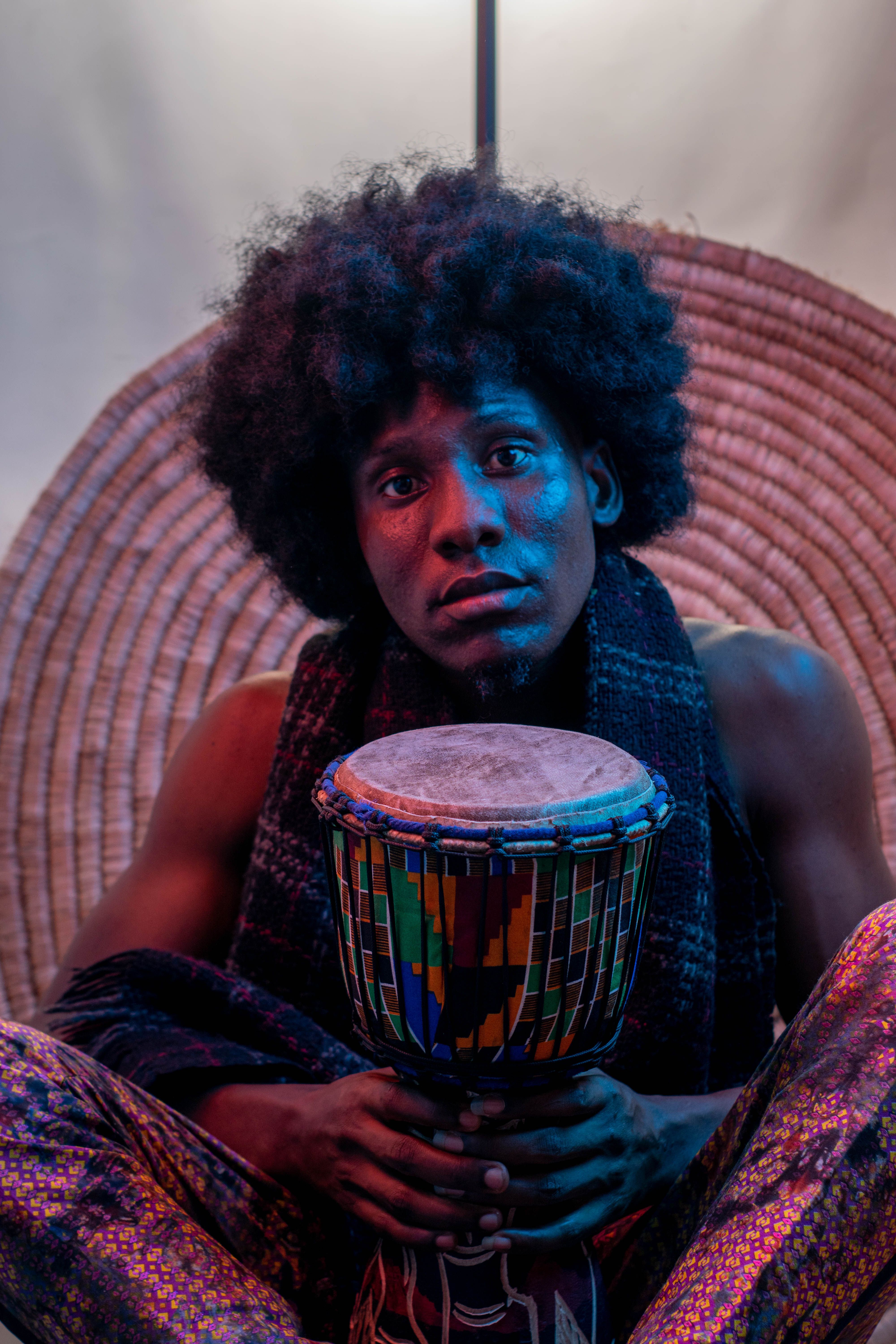 Aaron Abrams, rhythm facilitator, with a handmade drum